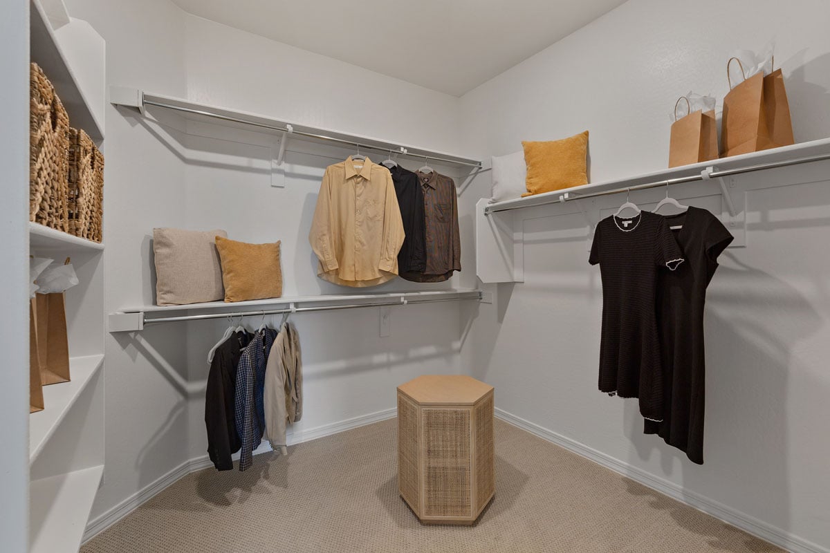 Walk-in closet at primary bedroom