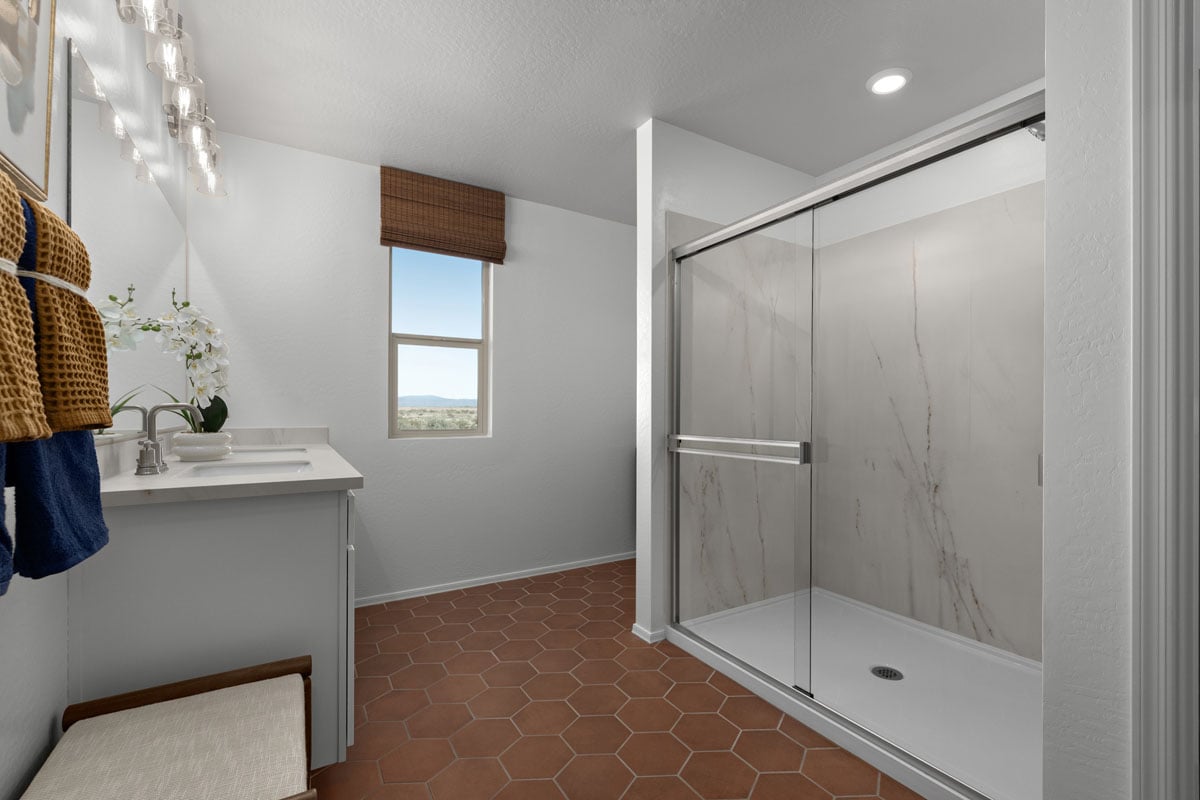 Walk-in shower at primary bath