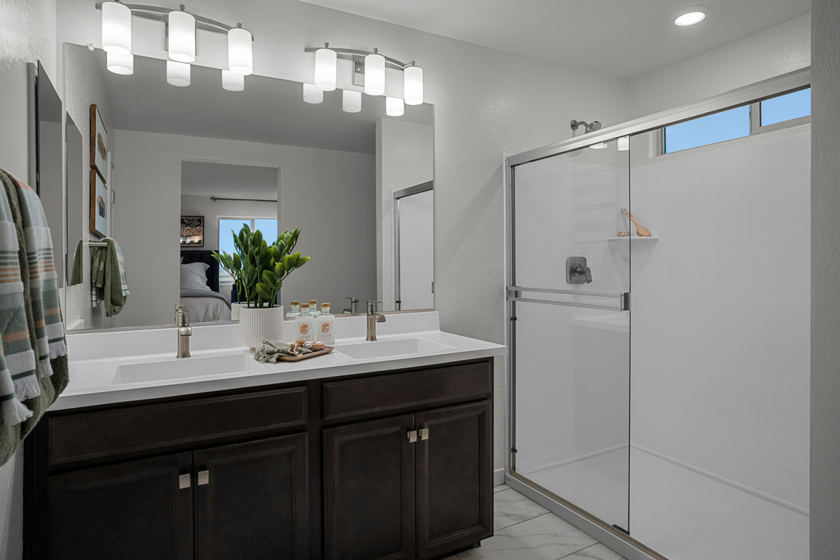 Walk-in shower at primary bathroom