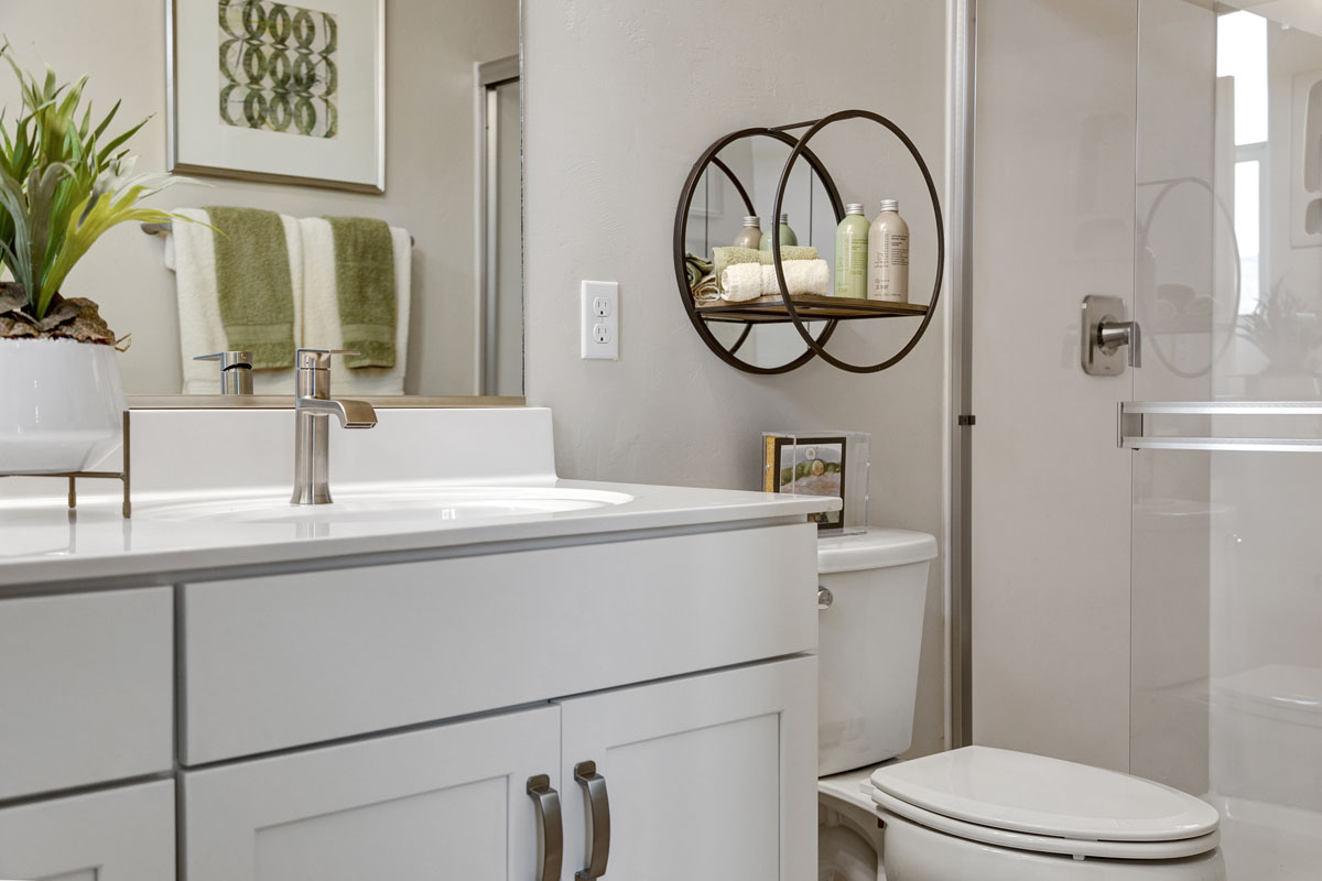 Shower with marble surround at primary bath