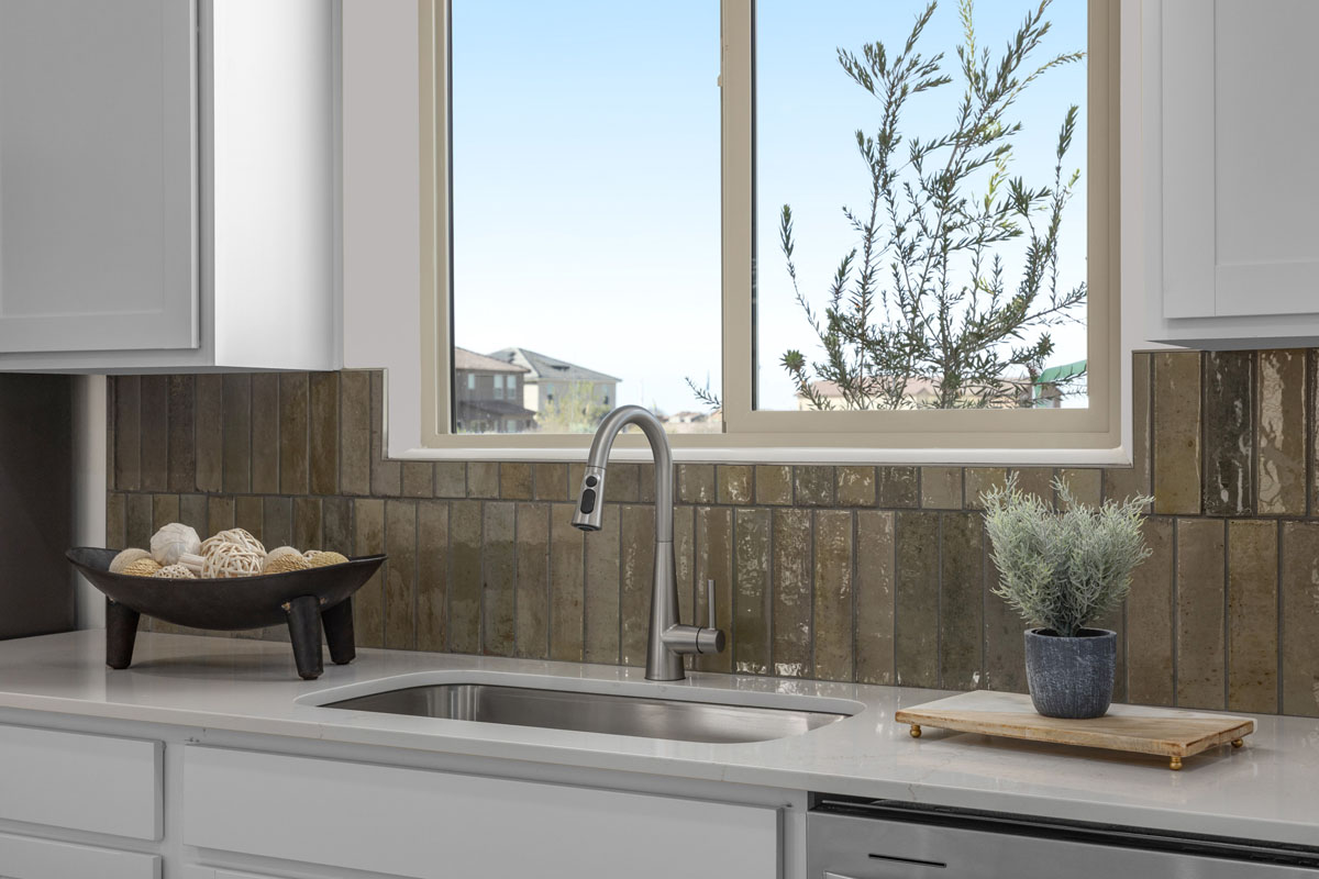 Optional tile backsplash at kitchen