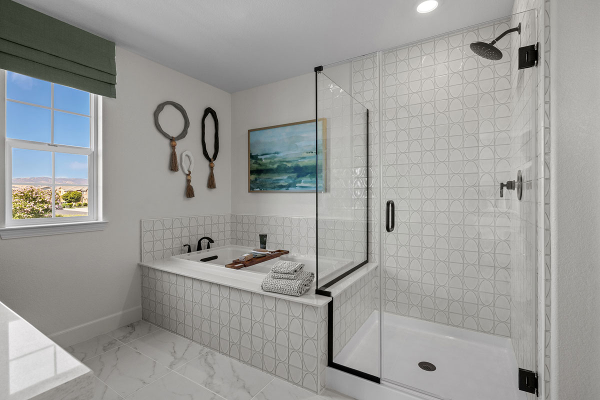 Soaker tub and separate shower at primary bath 