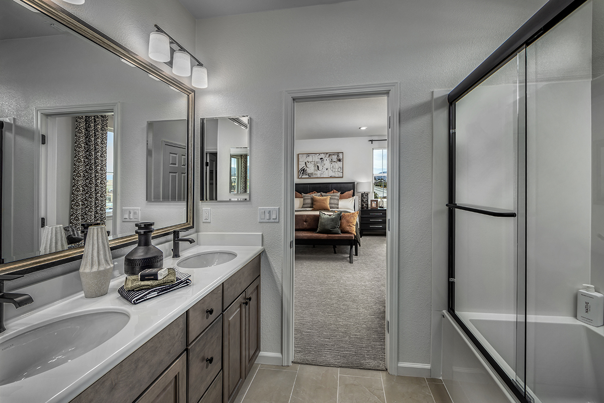 Dual-sink vanity at primary bathroom