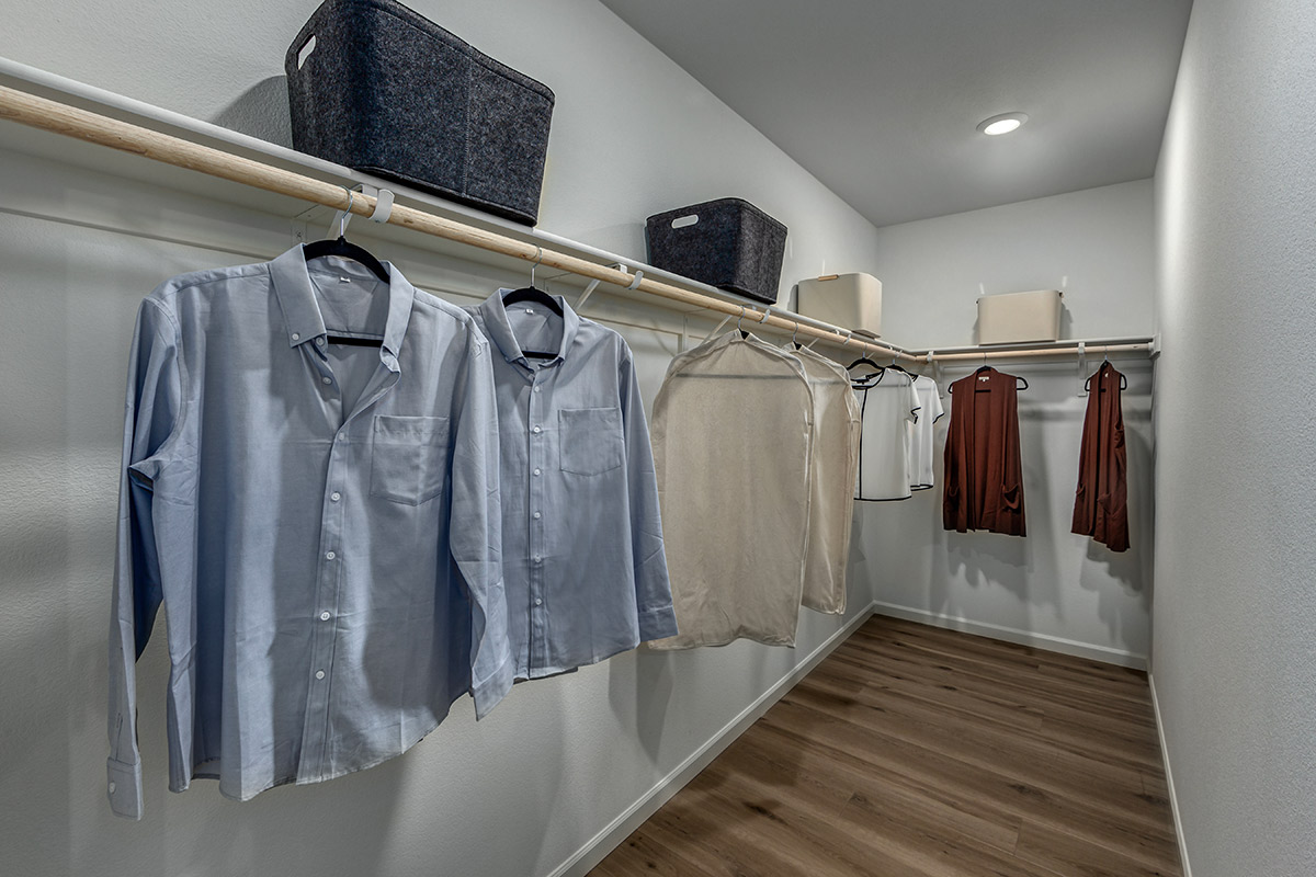 Large walk-in closet at primary suite