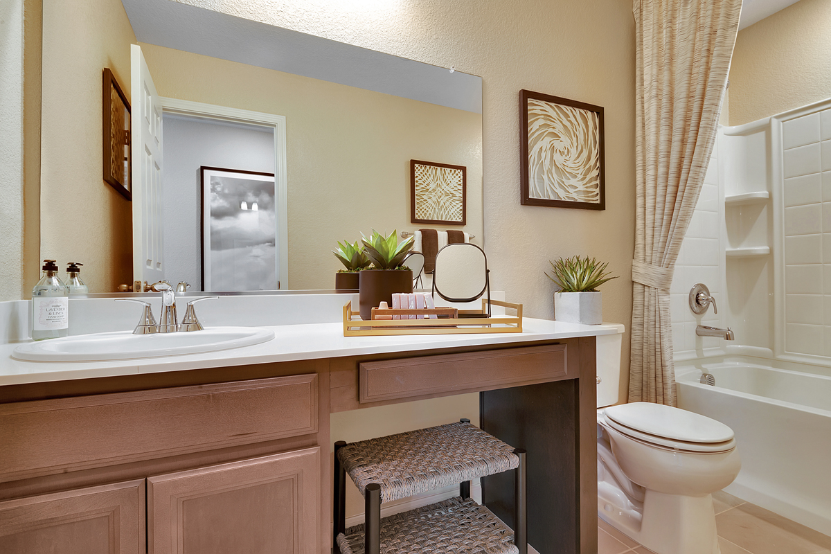 Vanity with knee space at secondary bathrooms