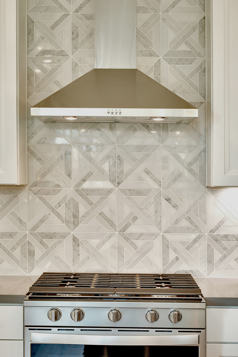Gas range and designer-selected hood