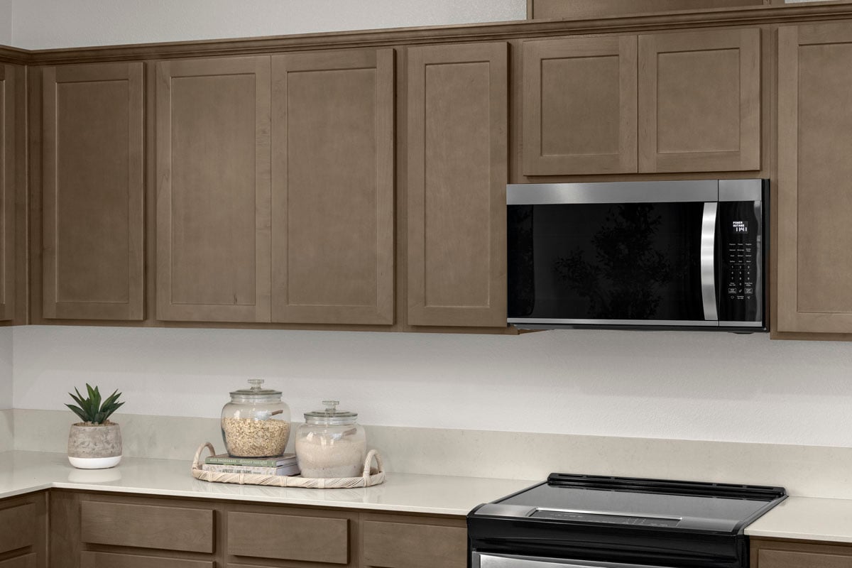 Recessed-panel stained birch cabinets