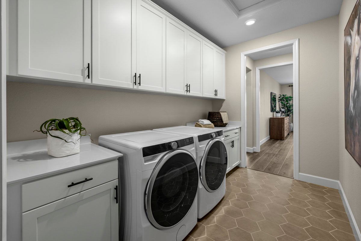 Large laundry room with storage 