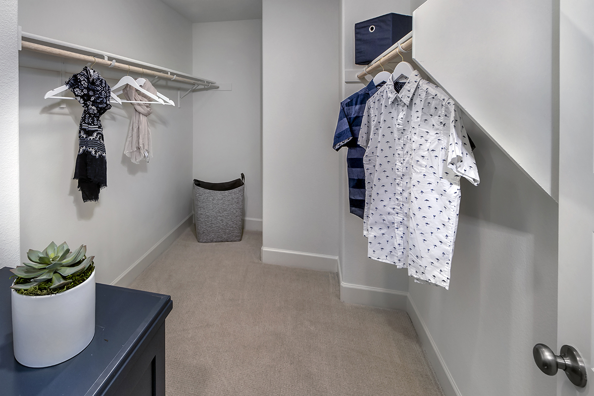 Walk-in closet at primary bedroom