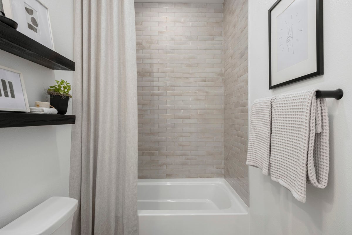 Tub/shower combination with tile surround at bath 2