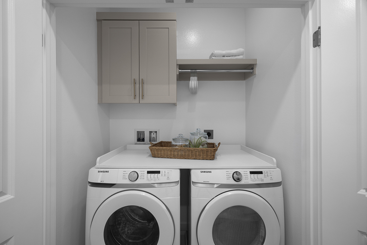 Optional laundry upper cabinets, shelf and pole