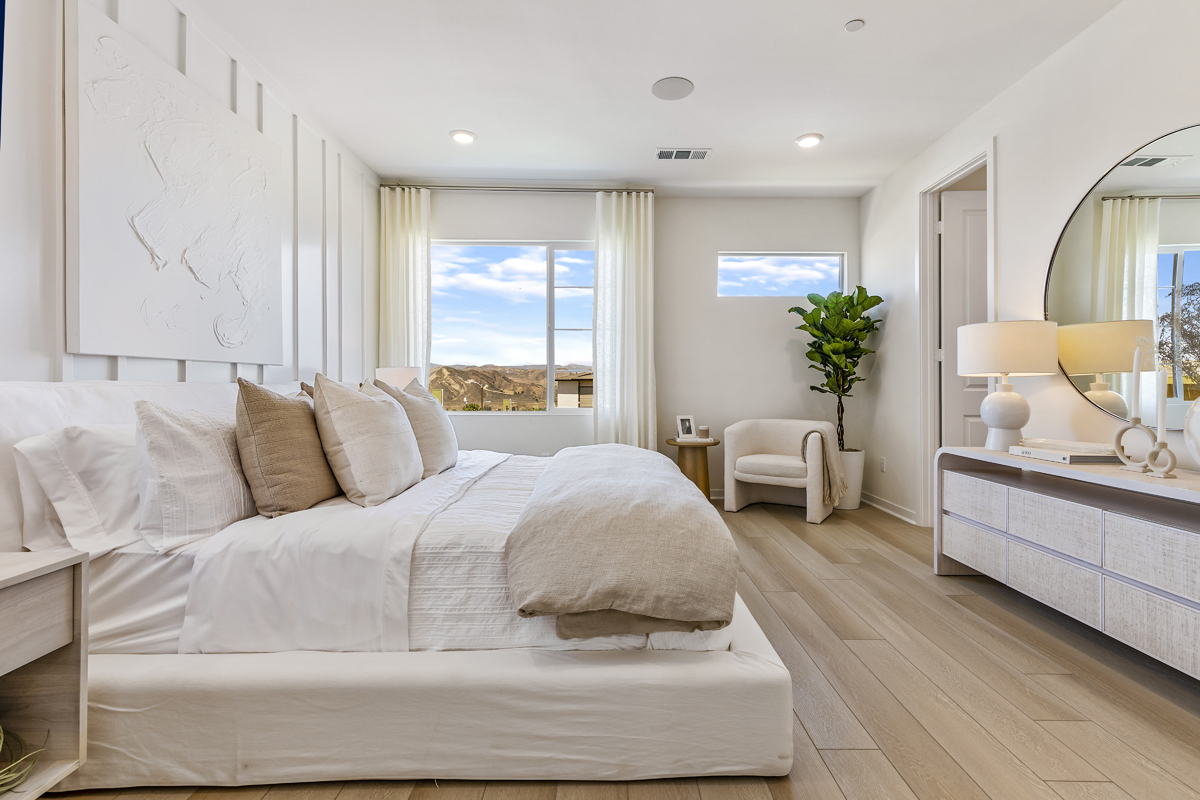 Luxury vinyl plank flooring at primary bedroom