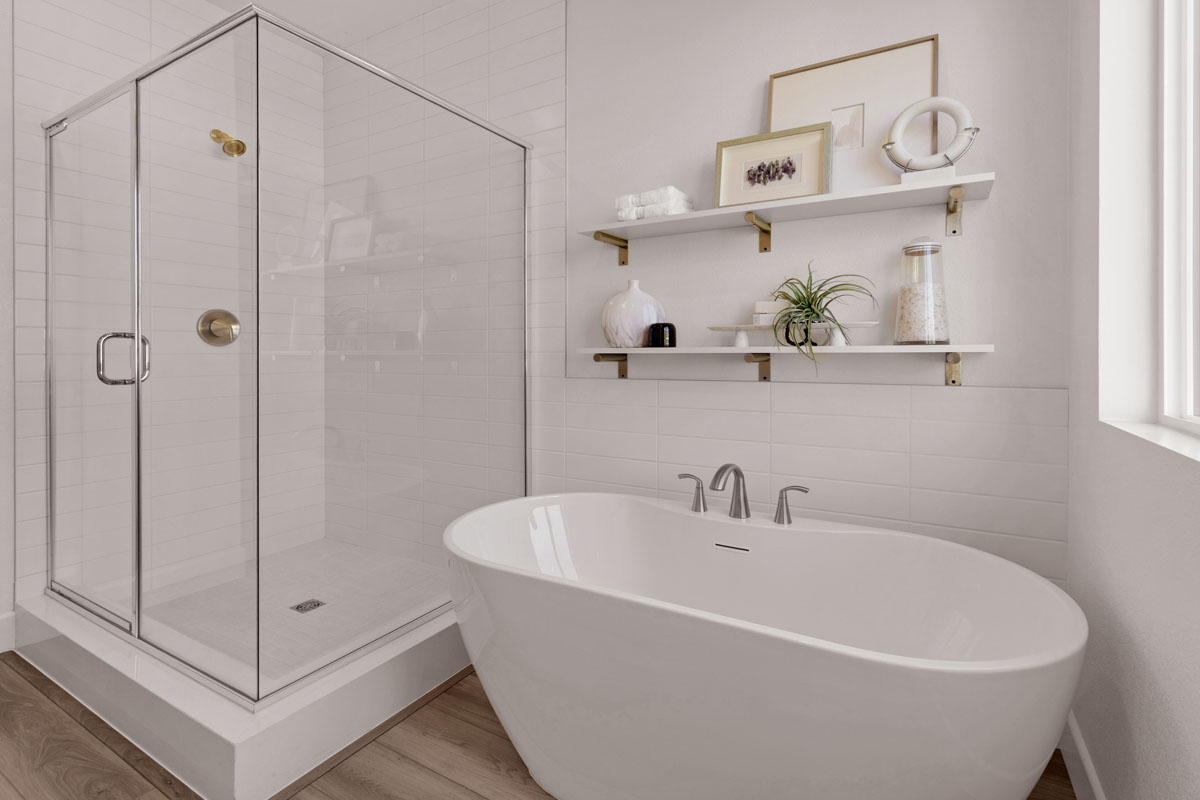 Soaker tub and separate walk-in shower at primary bath
