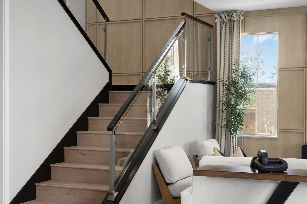 Optional maple stair rail system with glass panels