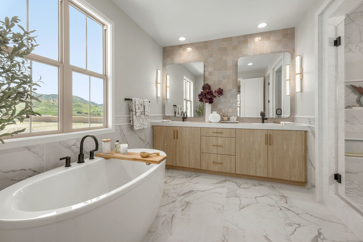 Freestanding tub and separate walk-in shower at primary bath