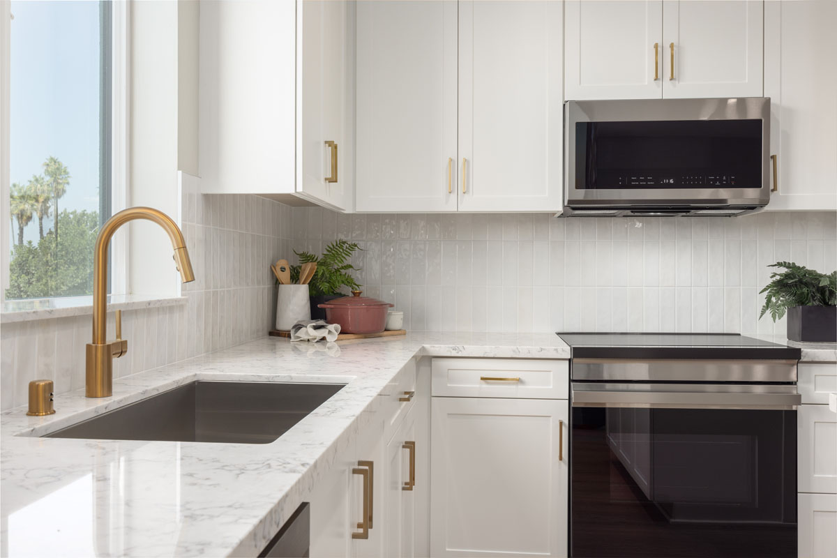 Optional quartz countertops with custom tile backsplash