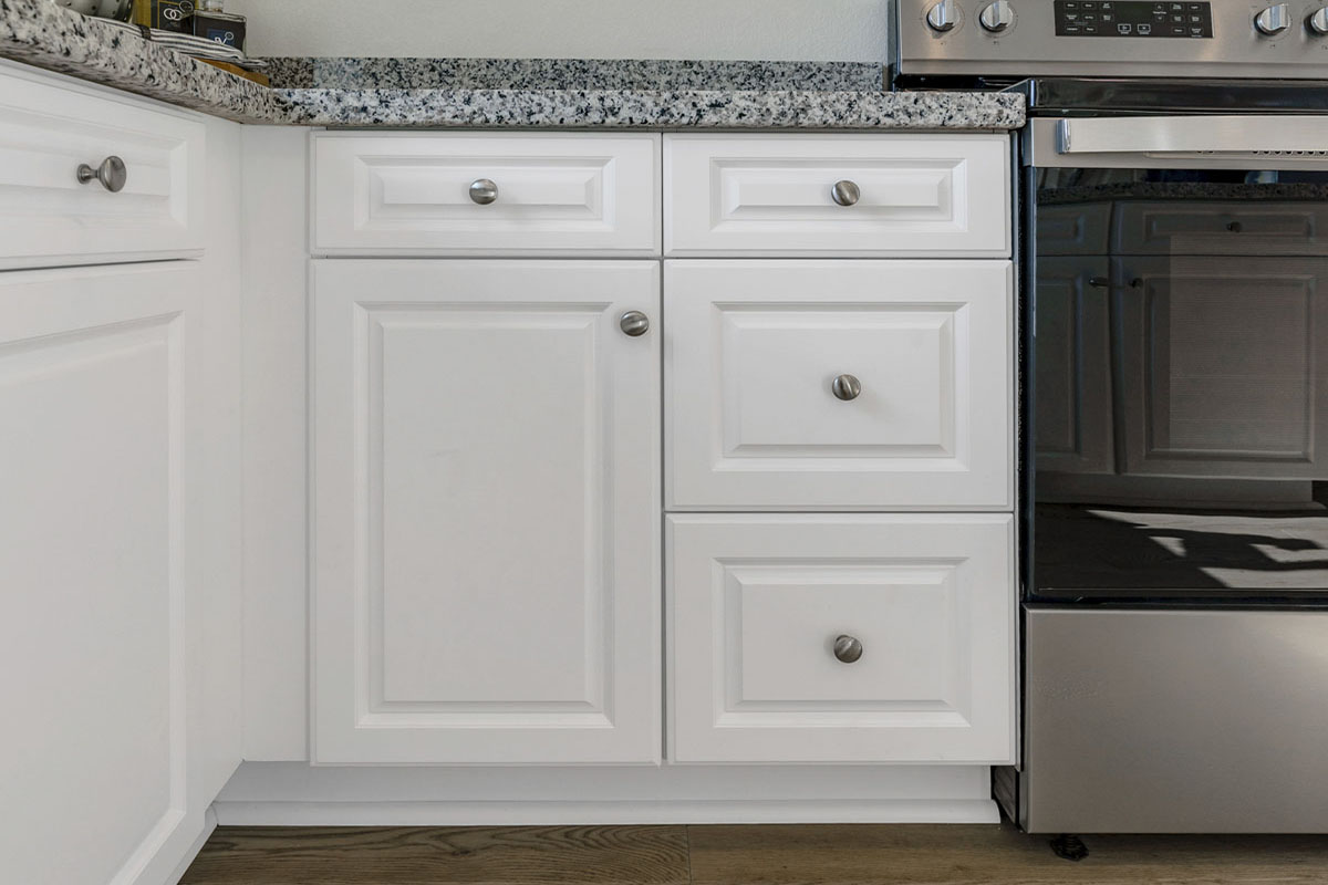Included White Thermofoil cabinets