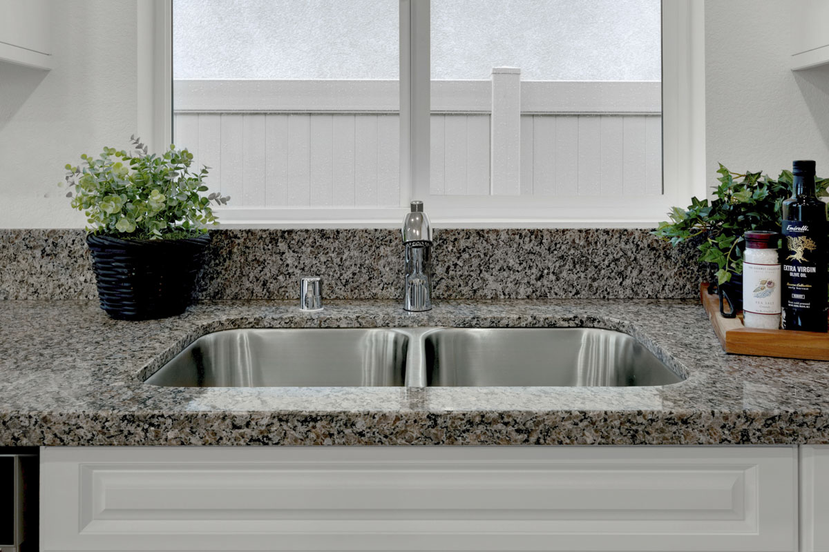 Included granite countertops and dual sink