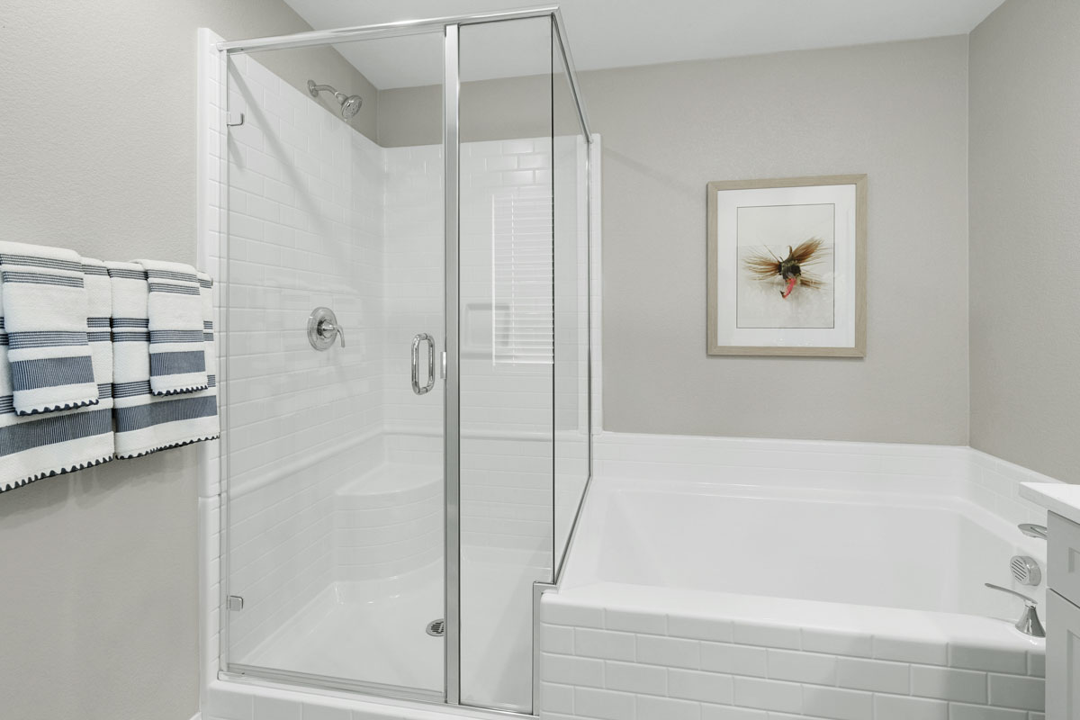 Upgraded tub and separate shower at primary bathroom