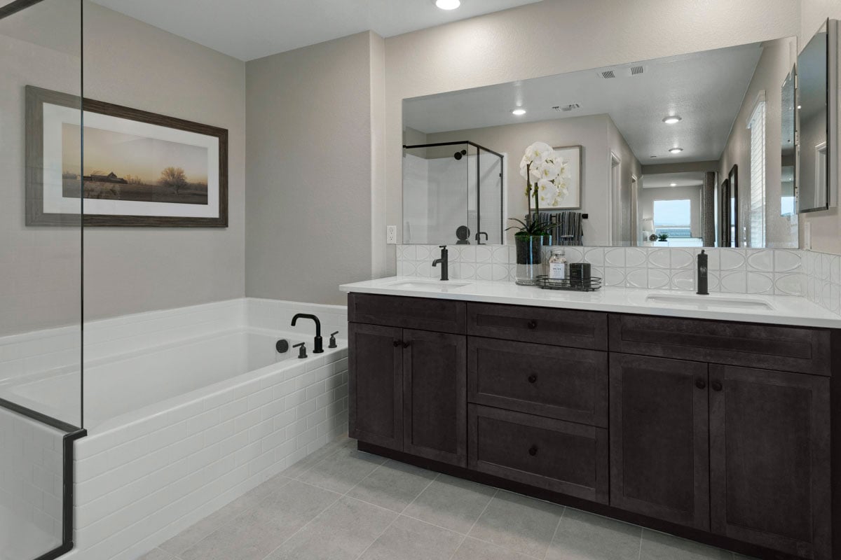 Upgraded extended vanity with cabinets at primary bathroom