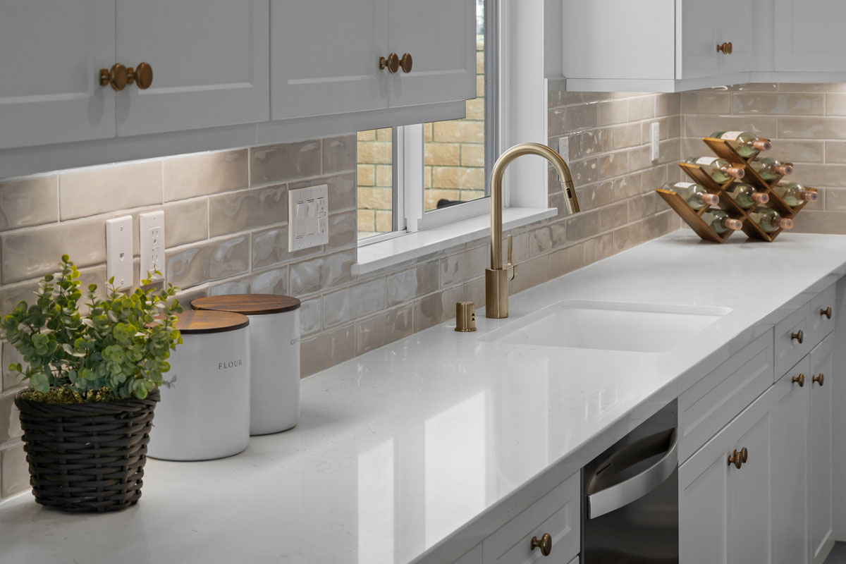 Upgraded kitchen countertops with tile backsplash