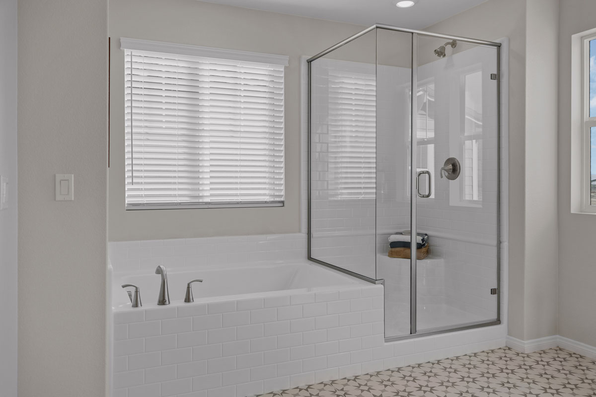 Upgraded separate tub and shower at primary bath