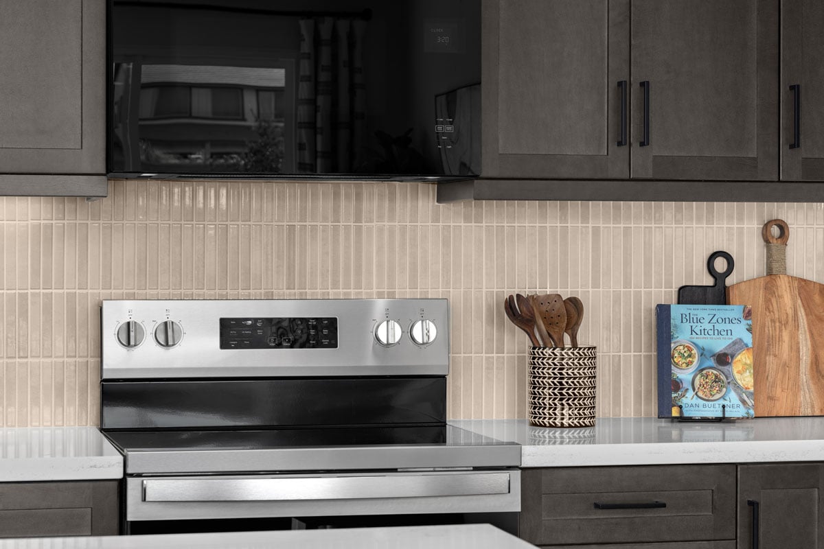 Optional quartz countertops and custom tile backsplash