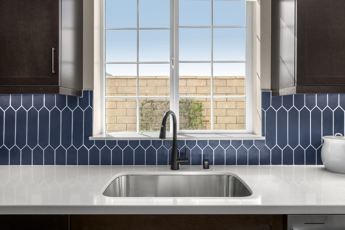 Optional quartz countertops and custom tile backsplash 