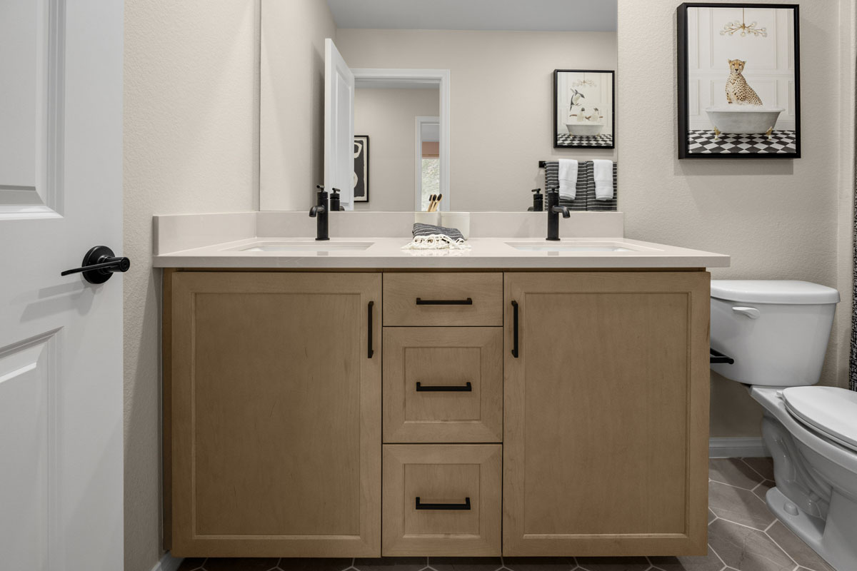 Optional Shaker-style maple cabinets with black pulls