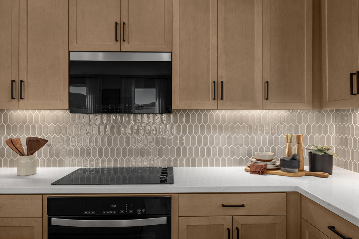 Optional quartz countertops and custom tile backsplash