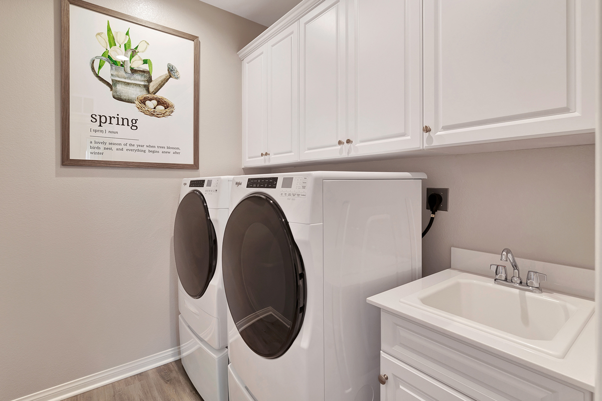 Upgraded upper and lower laundry room cabinets