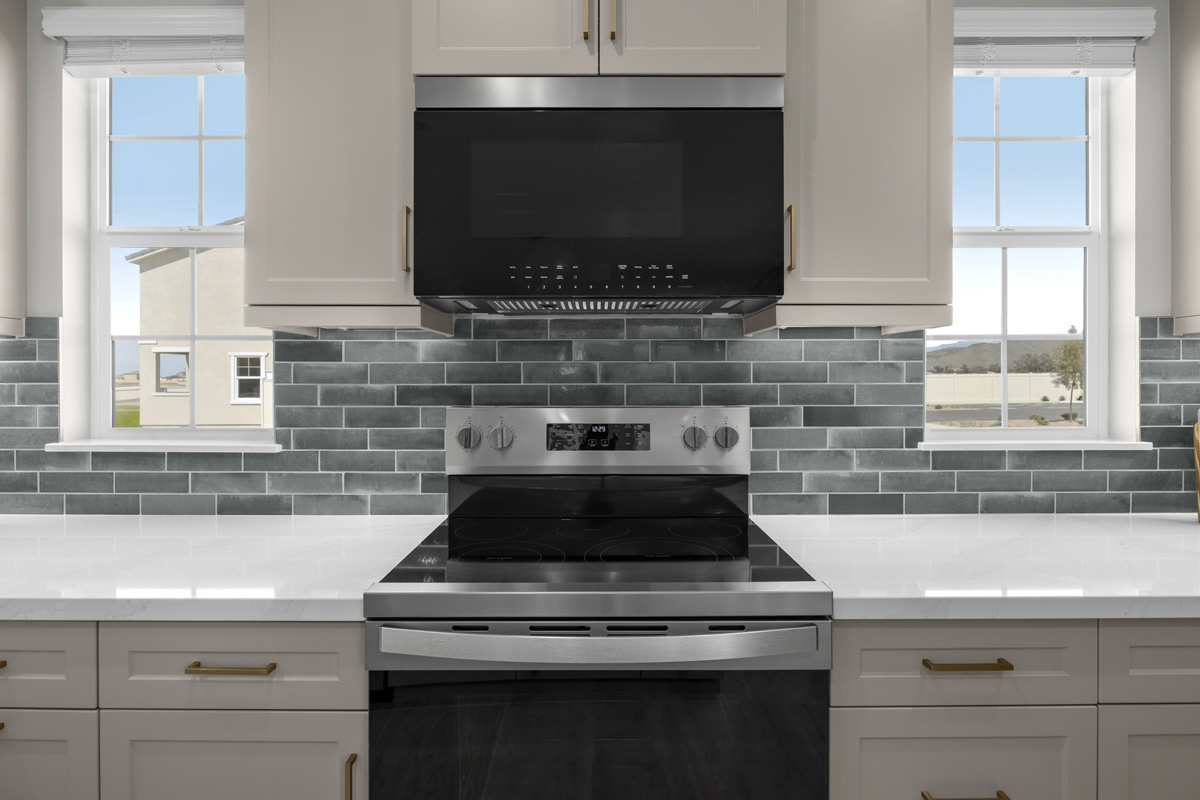 Optional custom tile backsplash and quartz countertops