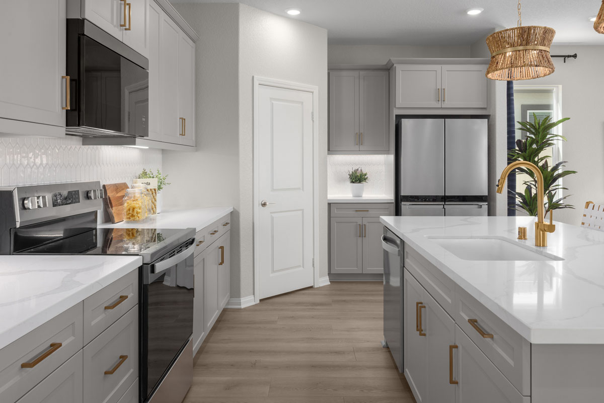 Optional Shaker-style cabinets with gold pulls