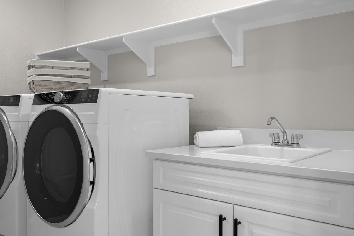 Optional laundry sink with lower cabinets