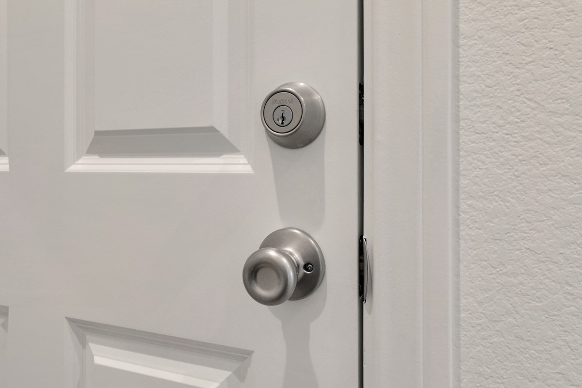 Satin nickel interior door hardware with antimicrobial technology