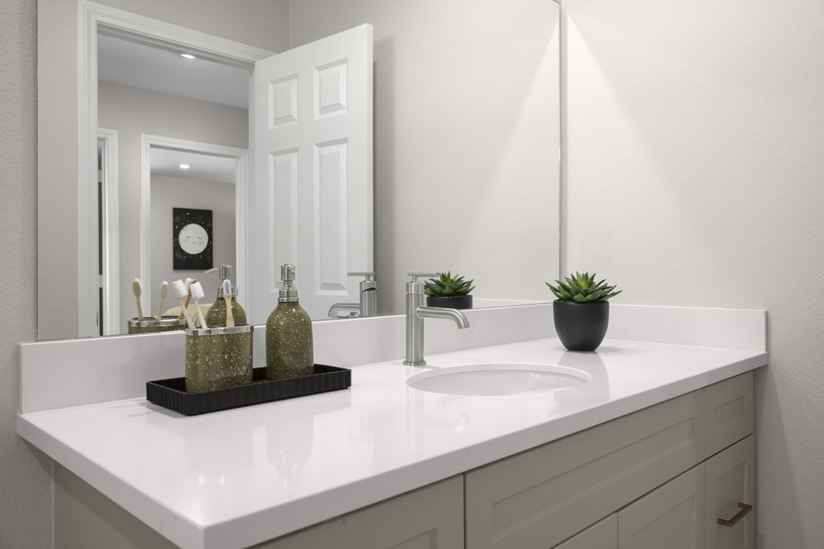 White engineered stone bath countertops