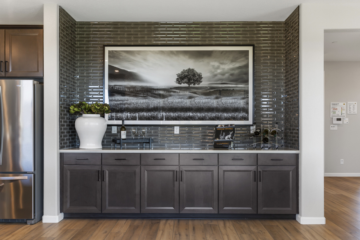 Upgraded cabinets in niche between kitchen and great room