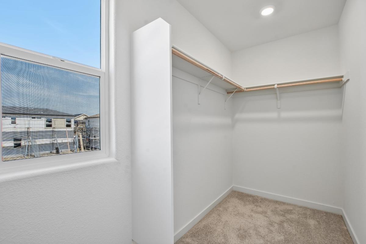 Primary walk-in closet