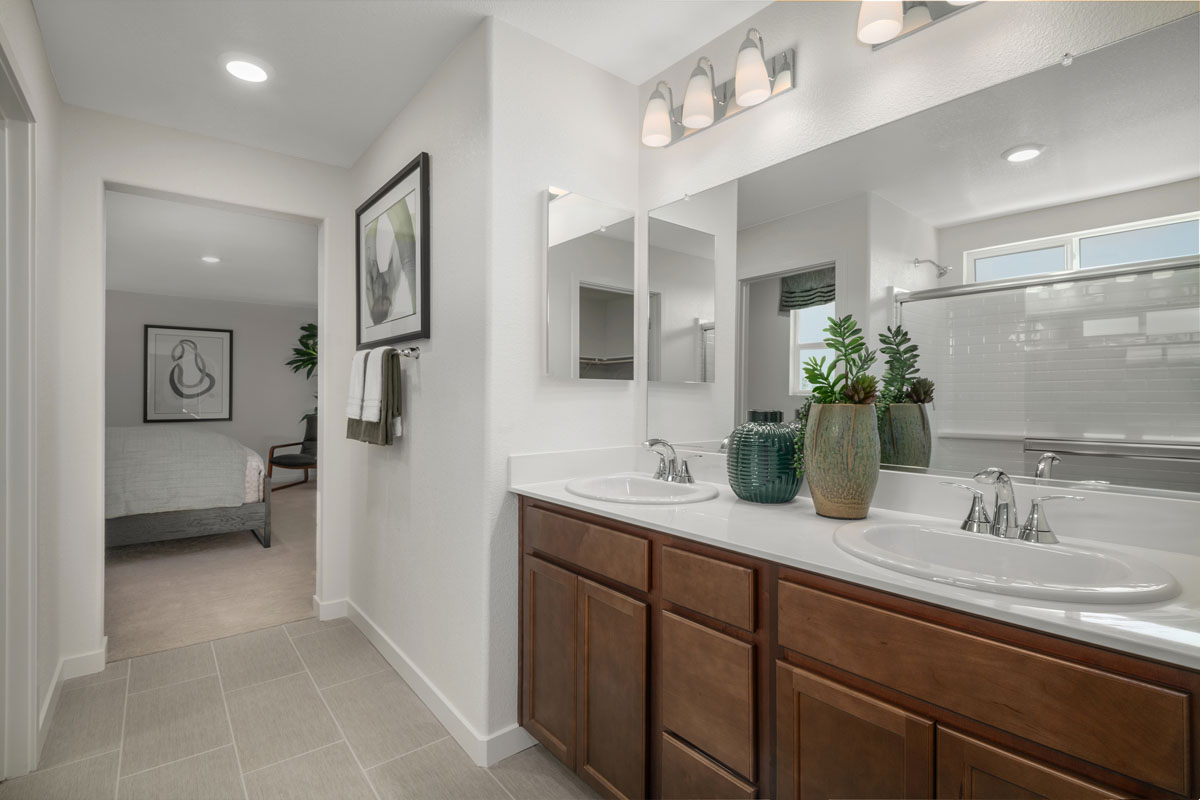 Solid-surface countertops at primary bath