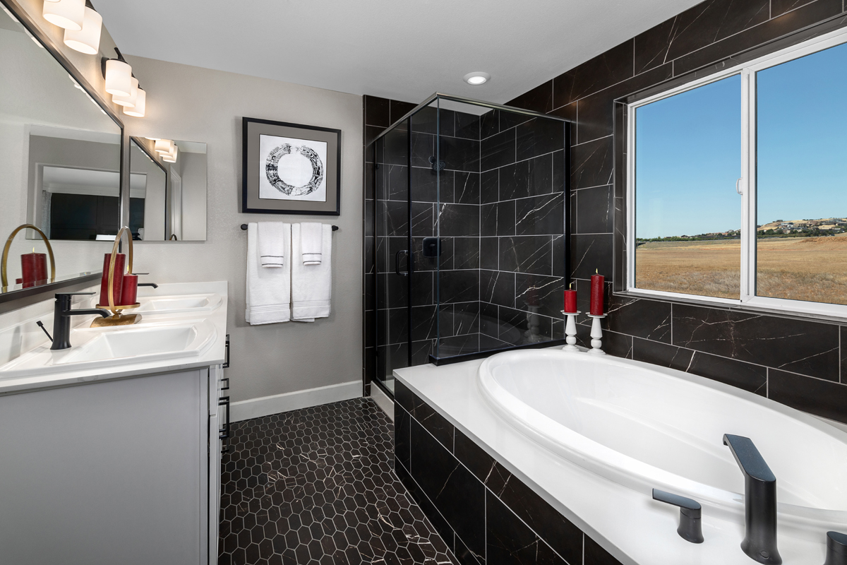 Soaking tub with tile surround at primary bath