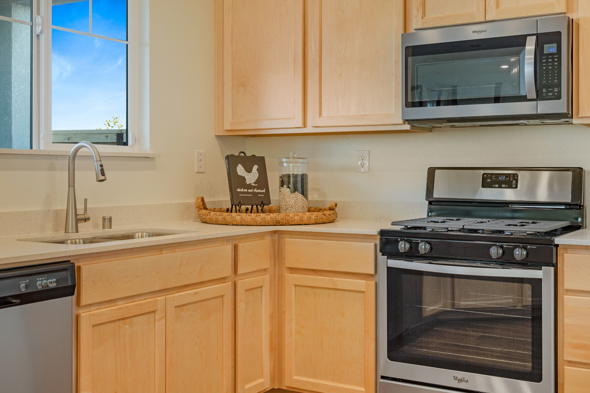 Quartz countertops and stainless steel kitchen appliances