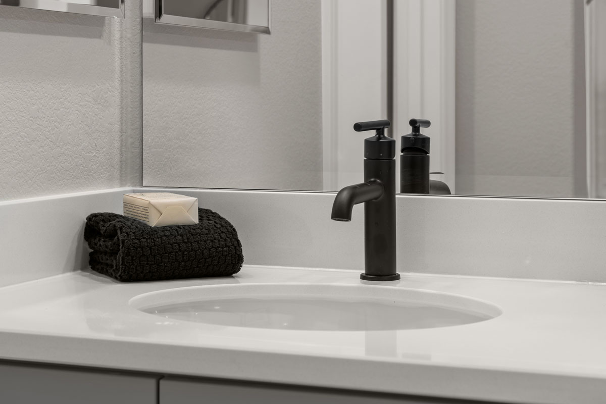 Upgraded matte black bath fixtures and accessories