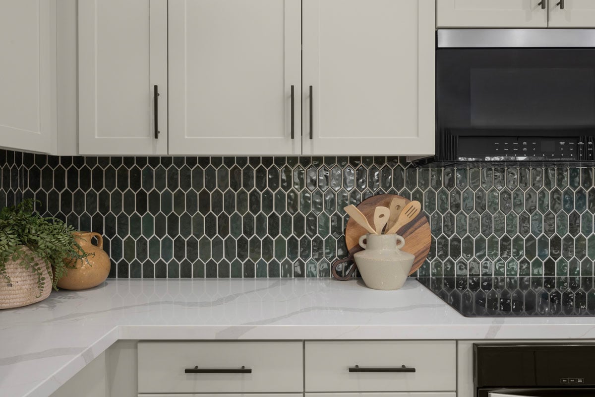 Optional custom tile backsplash and quartz countertops