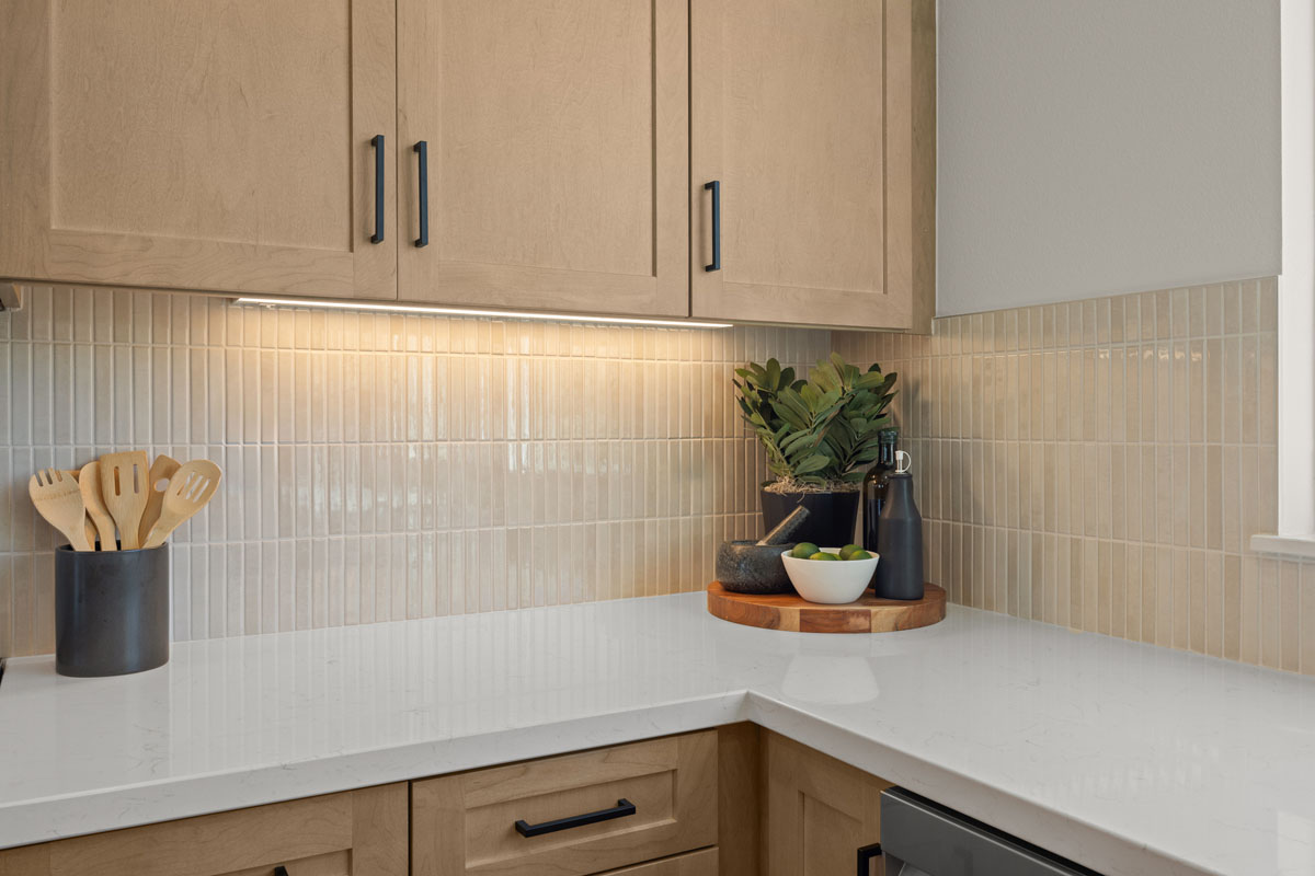 Optional quartz countertops and full tile backsplash