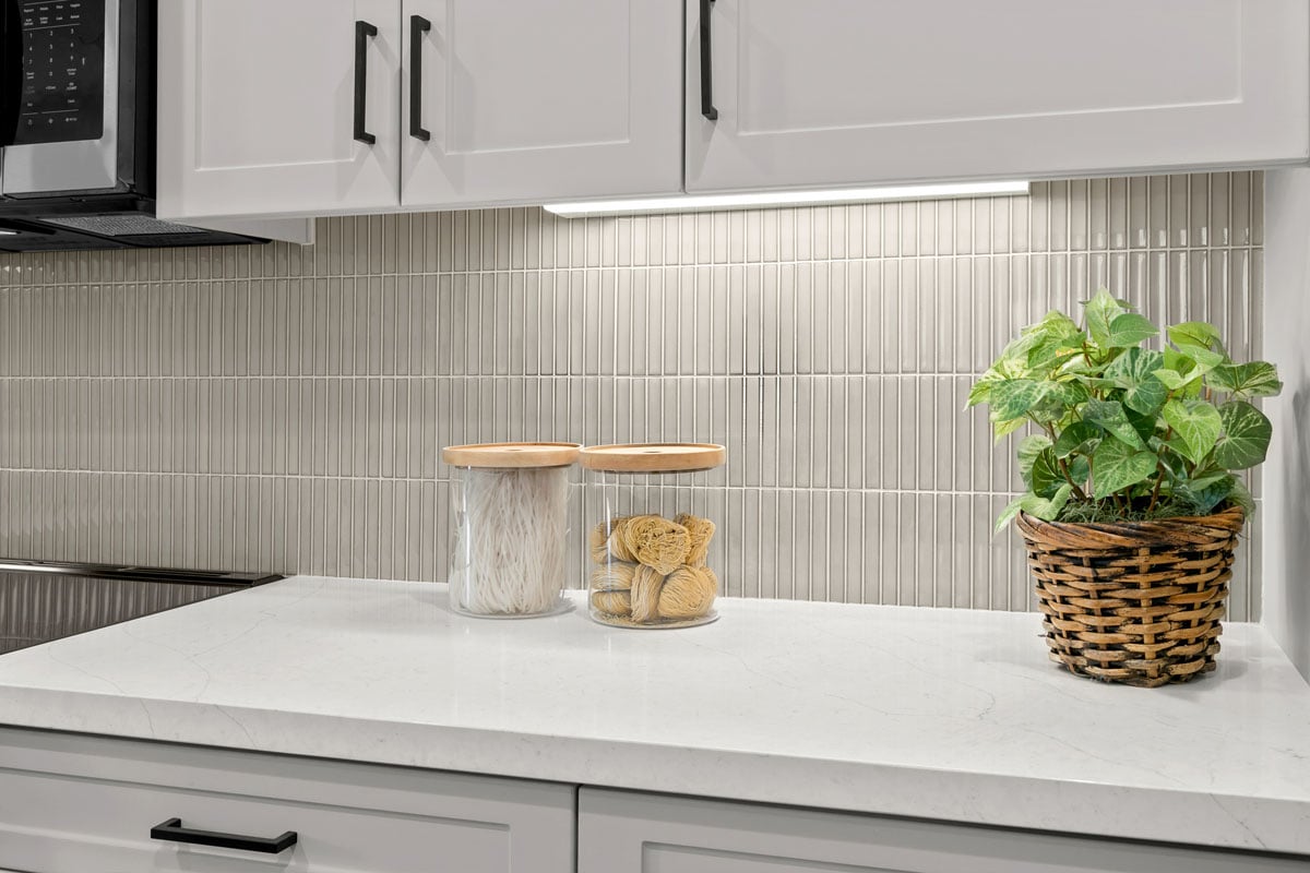 Optional quartz countertops with custom tile backsplash