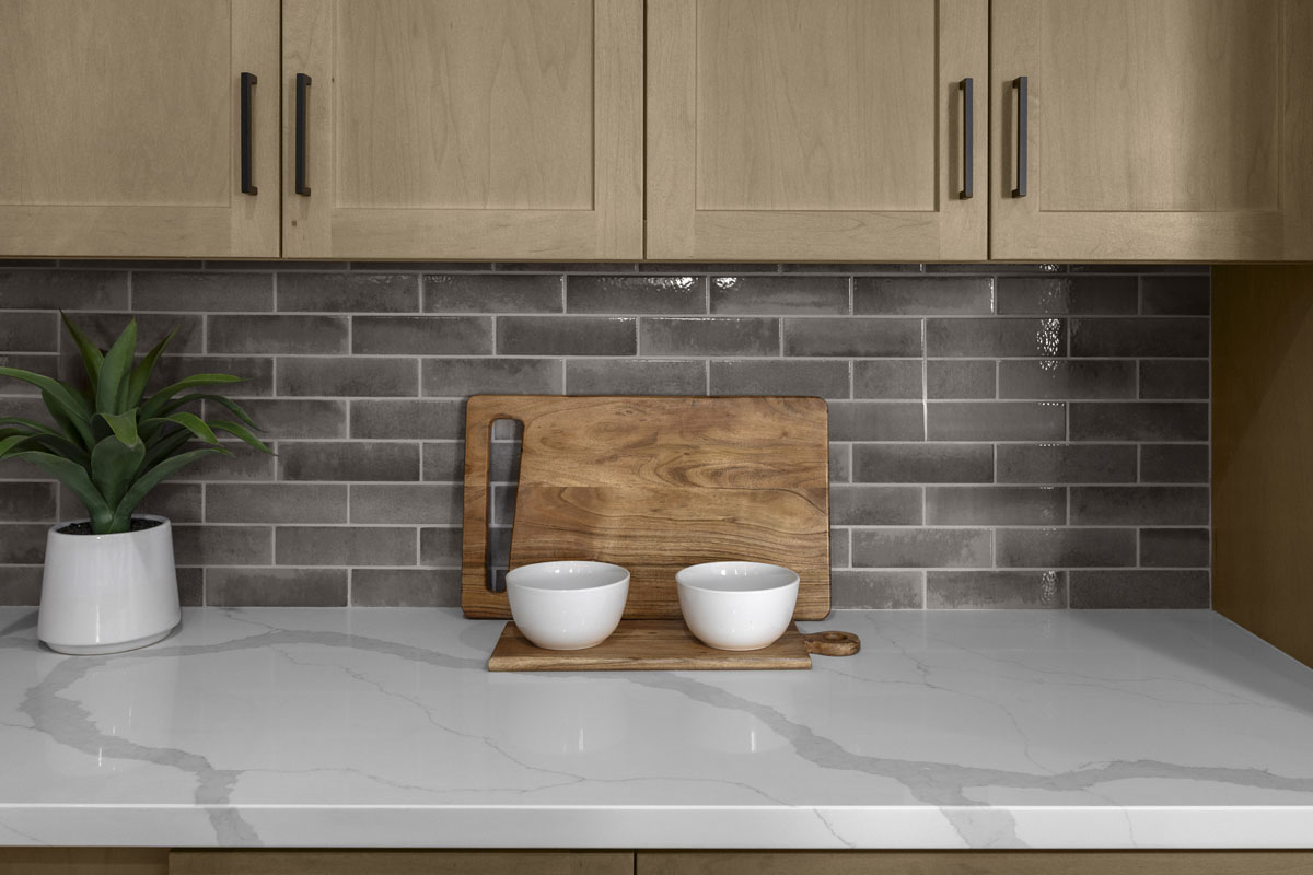 Optional quartz countertops and custom tile backsplash