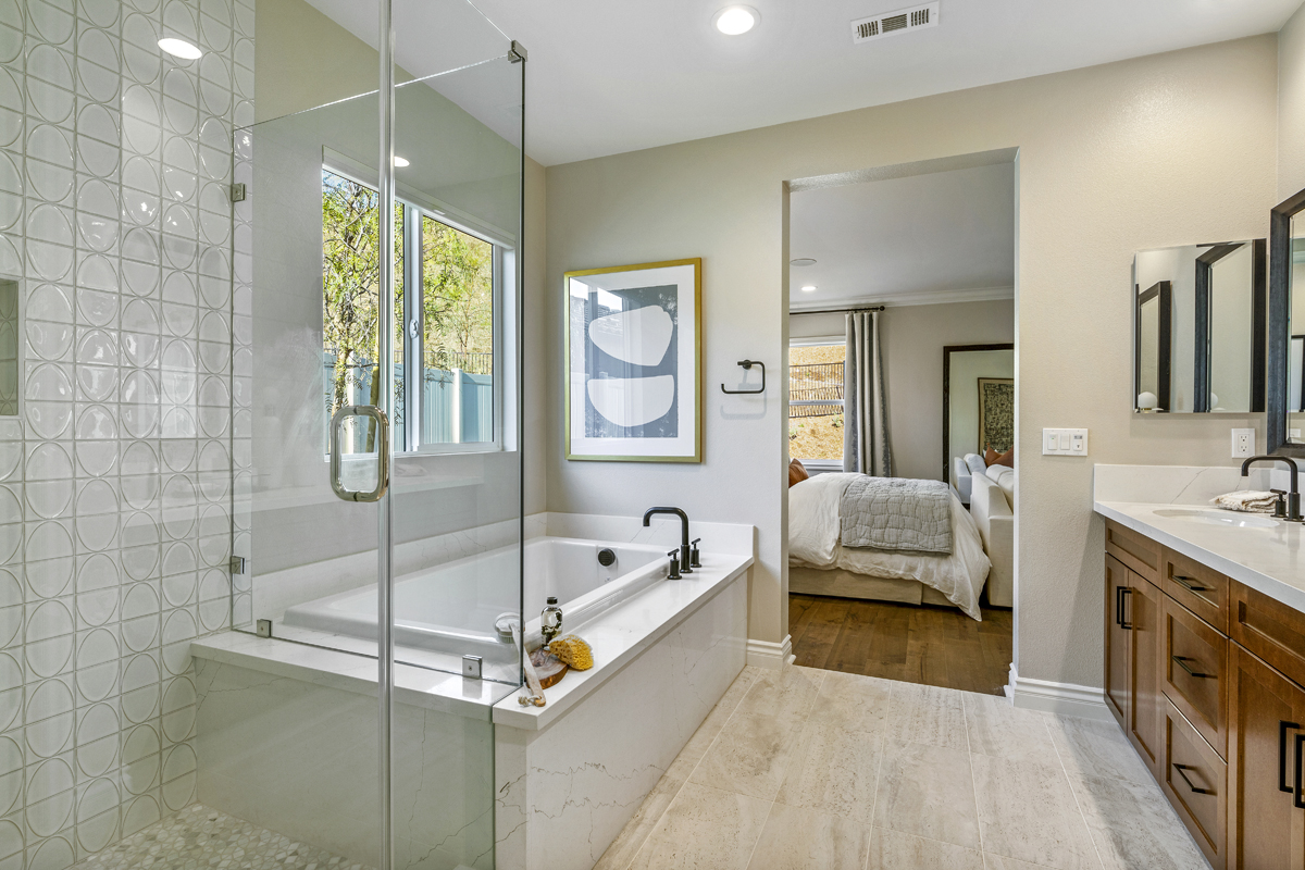 Upgraded acrylic tub and shower at primary bath