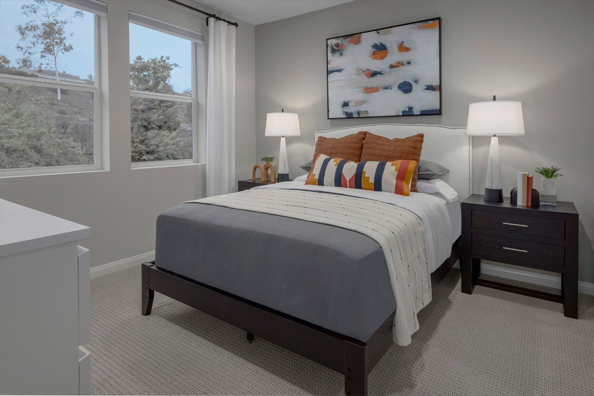 KB model home primary bedroom in Lemon Grove, CA