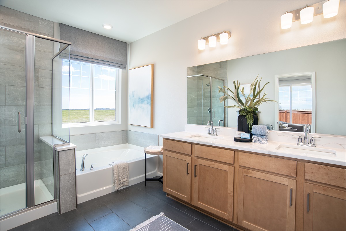 Soaker tub with tile surround at primary bath