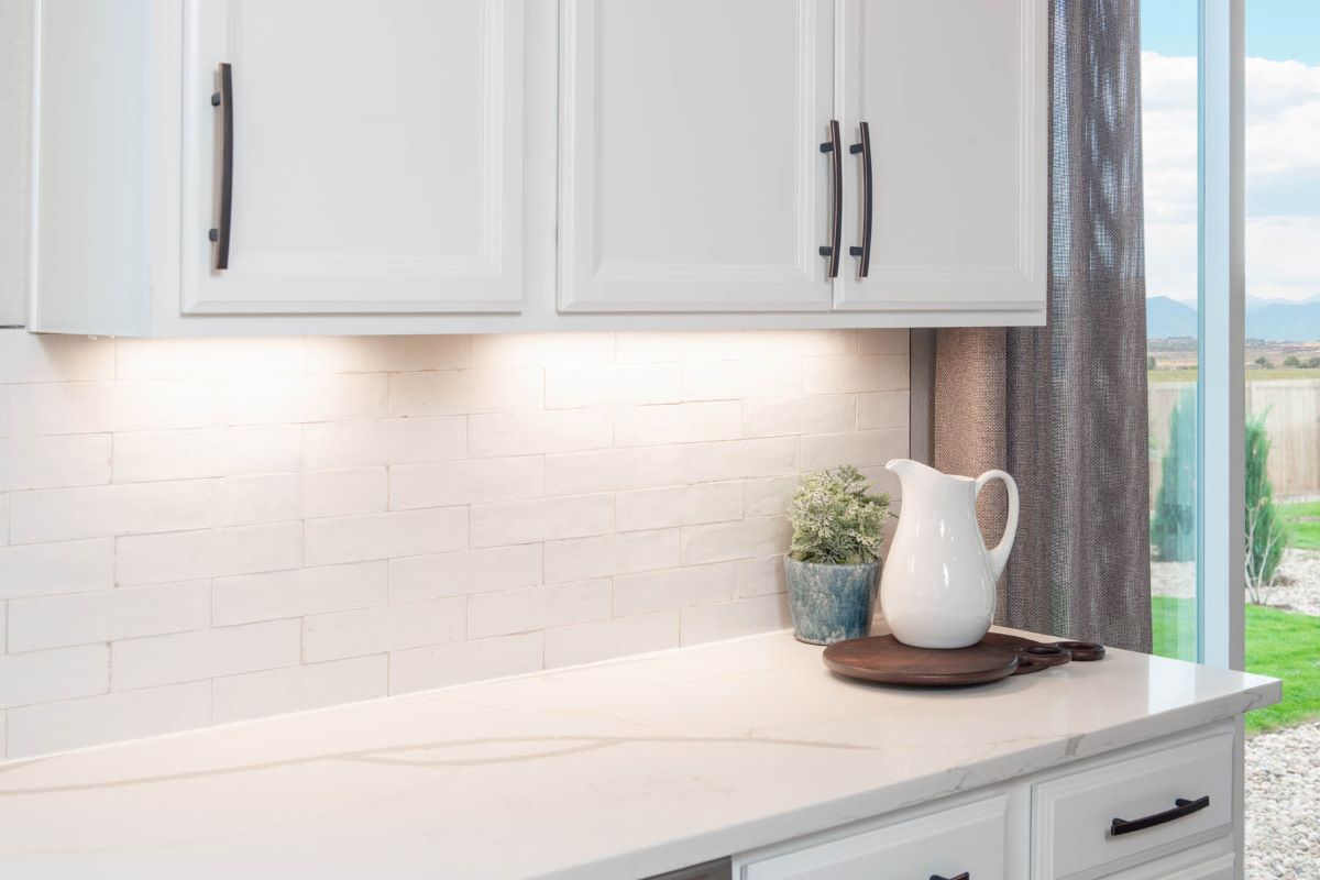 Countertop and tile surround at kitchen